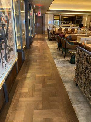 SmartWood planks installed in a refined basketweave pattern, adding warmth and luxurious style to ZZ's Club New York.