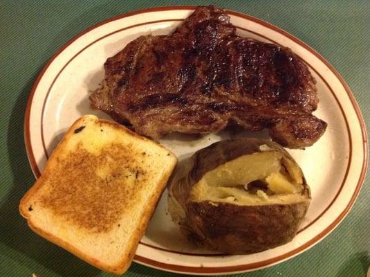 NY Strip. The potato was old. The part of the strip from the bread to the potato was all fat. No trimming before weighing!