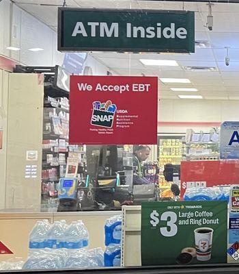 Sitting at counter with door locked ignoring customers knocking at door...