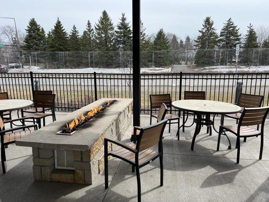 Outdoor seating away from the busy street