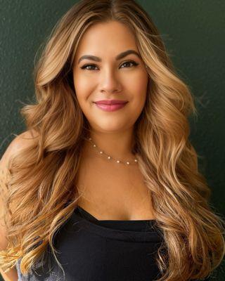 Warm blonde color and haircut