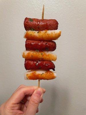 So-tteok So-tteok ( Rice cake and sausage skewer)