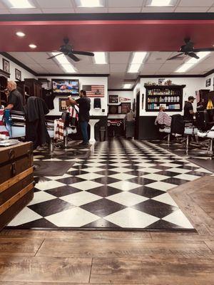 I love this place. It's what I imagine when I close my eyes and think of a quintessential barber shop.
