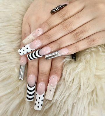 Gel X full set with nail design.