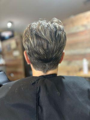 Get a chic women's short haircut at Mercia's Hair Boutique in Brooksville, FL! Image shows a stylish cut in our modern salon. Book now!