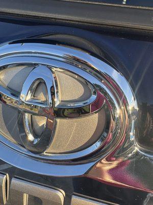 Scratches to Toyota logo