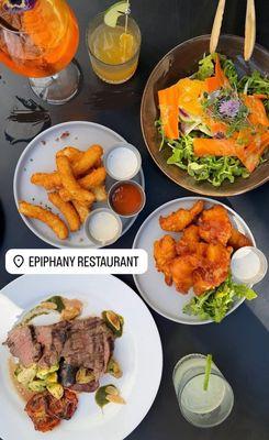 Clockwise: Aperol spritz, ginger mule, vegetable crudo, chicken tenders, pineapple sour, skirt steak, whipped potato puffs