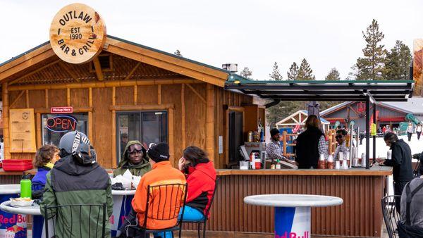 Adults enjoying beverages outside
