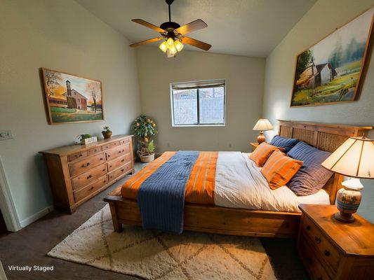 Photo of a bedroom with modern farmhouse style furnishings
