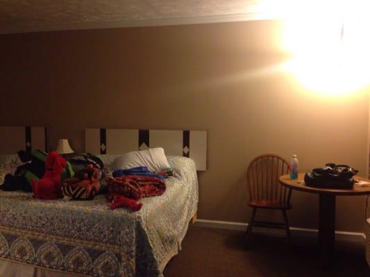 Simple, clean room with two doubles. Large mini fridge, wall mounted tv with dish & microwave.