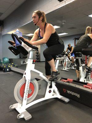 One of our trainers, Rachel Guess instructing our 6AM cycle class.