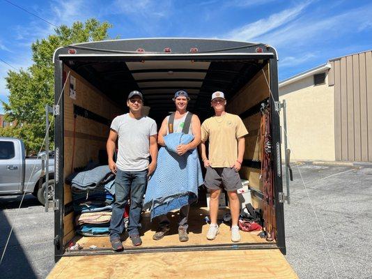 Israel, Jared and Aidan wrapping up a great move for a law office in downtown Spartanburg