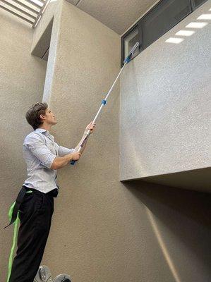 Stage 1 Alkaline stain cleaning
we let our winsol solution soak up on the window and scrub with our mikita extension pole