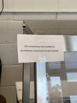 They have notice of the 3% convenience fee by the register as pictured and on the monitor menus