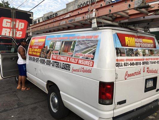 PARTIAL WRAP ON COMMERCIAL CONSTRUCTION VEHICLE WITH CUSTOM DESIGN AND VINYL DECAL