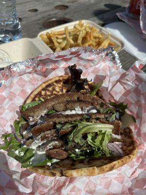 Beef/lamb super gyro (no tomatoes) and a side of seasoned fries