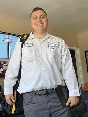 And look at that great smile, you can tell he enjoys his job.