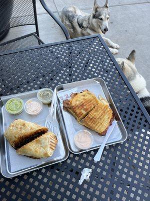 Steak and egg burrito. Breakfast sandwich with bacon and egg.