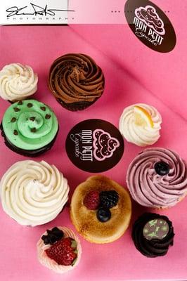 A selection of gourmet cupcakes from Mon Petit Cupcake, LLC available at Chocolaterie Stam and in Winona at Bluff Country Co-op