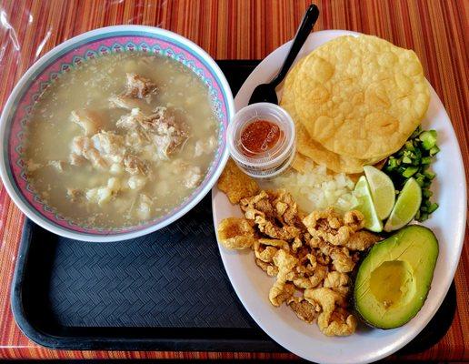 Pazole Blanco (White Pazole) - Stewed Pork and Hominy Soup with garnishes on the side.