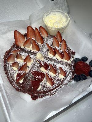 Red velvet Waffles ( Strawberry Topping) with Phatz House Made Cream Cheese Frosting!