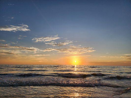 Steps away from Unit 109 you can catch a glorious sunset, and very likely see a dolphin or two!