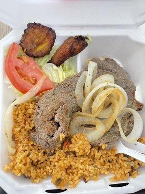 Bistek with maduros and arroz con gandules