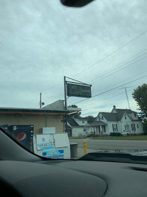 Outside of the liquor store, now called Cork Liquors