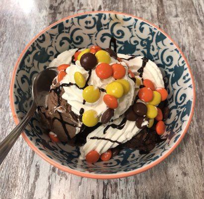 Reese's brownie explosion topped with a delicious house made whipped cream