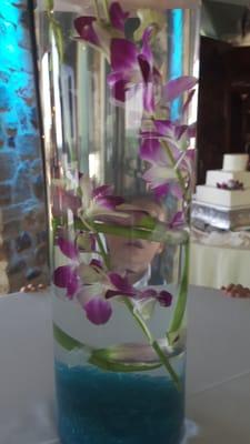 Broken stems held together by tape floating in the vase. Ugliest flowers ever.