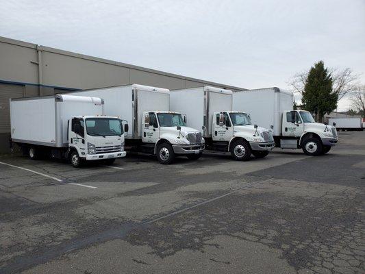 Our Trucks. We also have a cargo van for smaller moves.