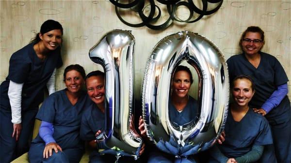 Heather J. Petroff, D.D.S. and her dental team celebrate caring for patients for over ten years.