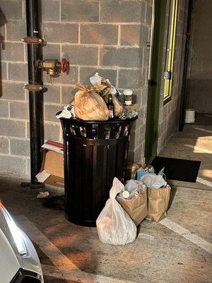 Overflowing garbage in parking deck
