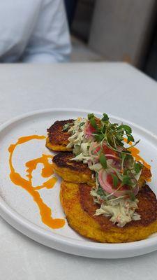 Tortillas de choclo (corn fritters, topped with crab salad) Best thing we had