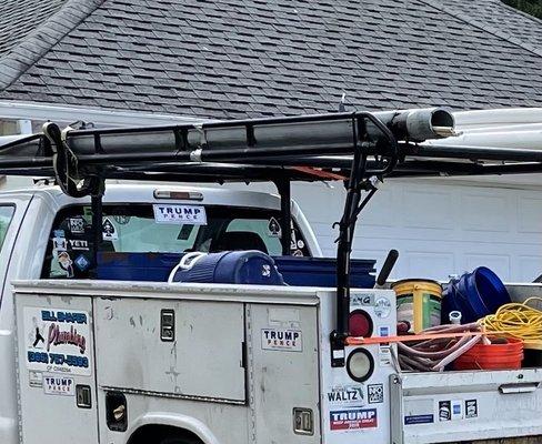 Shafer plumbing work truck and billboard.
