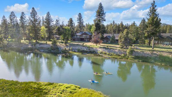 Riverfront view of Pony Express 7 with kayakers