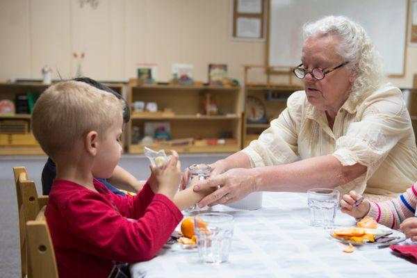 Children practice daily life skills and sensorial activities.