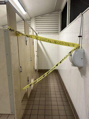 Showers taped off in bathrooms.