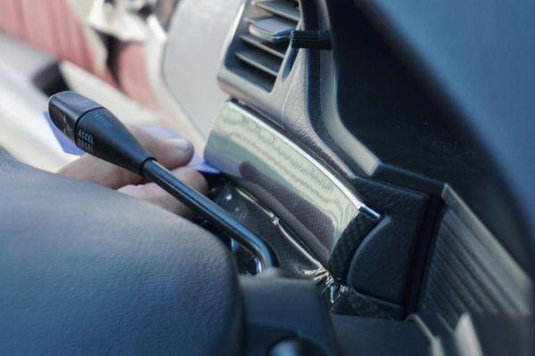 Interior trim recovered with carbon fiber vinyl wrap.