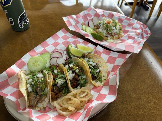 Carne, Asada, taco, steak and chorizo, taco, Tinga chicken sopes, Carnitas taco and El Pastor taco.