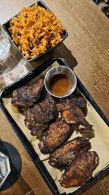 Jerk chicken and Jollof rice.