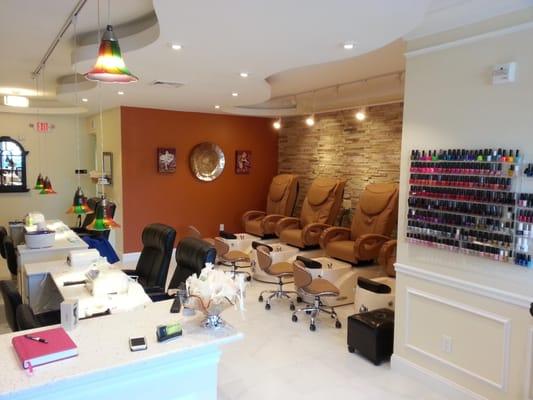 This project was totally gutted and the all new finishes transformed the space to a modern Nail Salon in Bedford, NH...
