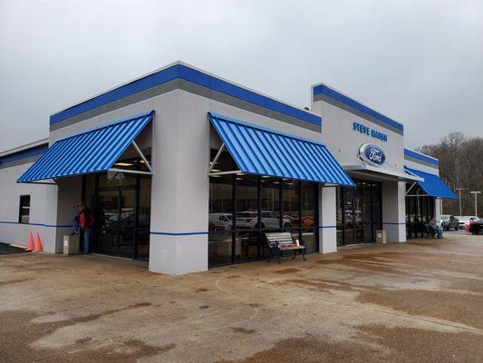 Standing seam metal awnings.