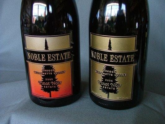 Carved and color filled glass wine bottles.