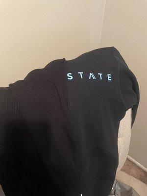 FADED BLACK HOODIE THAT I TOOK HERE! BEFORE IT WAS LIKE THE DRESS I COMPARED IT TO A DARK BLACK and now it is faded, cracked and ruined !