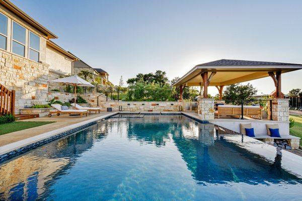 This pool in Dripping Springs offers clean lines and natural stone details.
