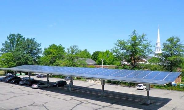 Beautiful solar carport with electric vehicle charging station shows their genuine commitment to being good stewards.
