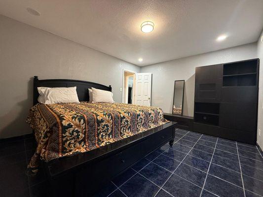 Bedroom with shelves for one of the apartment