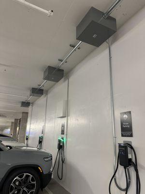 Commercial electrical conduit installation for Rivian EV Chargers. RaDD IQHQ, San Diego, CA