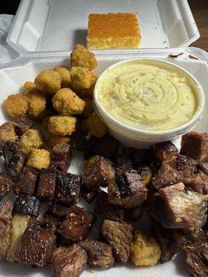 Burnt ends, fried okra, potato salad and corned bread.